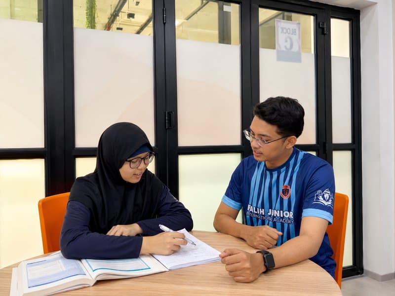 One-to-one mentoring session at Falih Junior